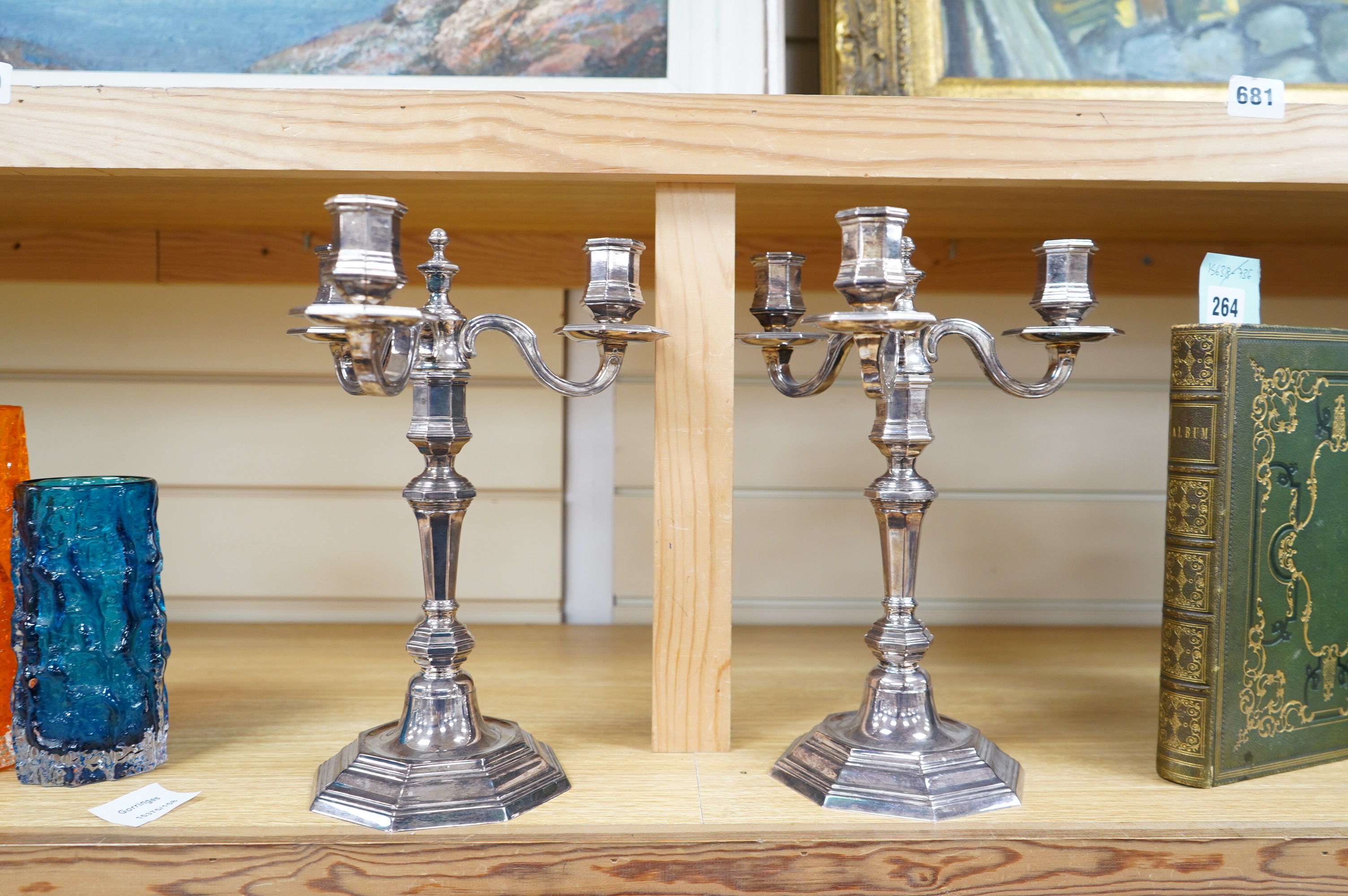 A matched pair of Christofle Cluny-design silver plated three arm candelabra, 28cm. Condition - good